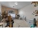 Bedroom with large window and a variety of furniture at 31637 W Grant St, Buckeye, AZ 85326