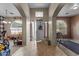 Open entryway with views of the living and dining areas at 31637 W Grant St, Buckeye, AZ 85326