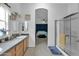 Bathroom with dual sinks and a walk-in shower at 3301 S Goldfield Rd # 1015, Apache Junction, AZ 85119
