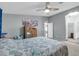 Main bedroom with ceiling fan and ample closet space at 3301 S Goldfield Rd # 1015, Apache Junction, AZ 85119
