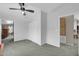 Bright bedroom with double sliding doors and access to another room at 3301 S Goldfield Rd # 1015, Apache Junction, AZ 85119