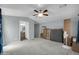 Primary bedroom with ceiling fan and ensuite bathroom access at 3301 S Goldfield Rd # 1015, Apache Junction, AZ 85119