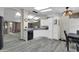 Bright kitchen with granite countertops and white cabinets at 3301 S Goldfield Rd # 1015, Apache Junction, AZ 85119