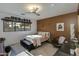 Comfortable bedroom featuring a window with natural light and a view, and minimalist decor at 3601 N 55Th Pl, Phoenix, AZ 85018