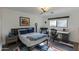 Stylish bedroom with modern decor, a dedicated workspace, and a comfortable vibe at 3601 N 55Th Pl, Phoenix, AZ 85018