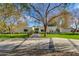 Modern home featuring a well-manicured lawn, a concrete driveway, and desert landscaping at 3601 N 55Th Pl, Phoenix, AZ 85018