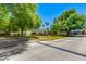 Expansive home with a long driveway and lush front yard landscaping at 3601 N 55Th Pl, Phoenix, AZ 85018