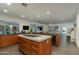 Spacious kitchen with large island, modern appliances, and wine refrigerator at 3601 N 55Th Pl, Phoenix, AZ 85018