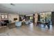 Open concept living room with fireplace, dining area and modern decor at 3601 N 55Th Pl, Phoenix, AZ 85018