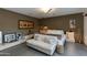 Stylish bedroom with modern decor, decorative pillows, and ceiling fan at 3601 N 55Th Pl, Phoenix, AZ 85018