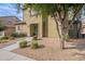 Two-story house with light brown exterior, landscaping, and a walkway at 3647 W Thalia Ct, Phoenix, AZ 85086