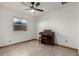 Bedroom with tile flooring, a window, and an electric piano at 3801 W Barnes Ln, Phoenix, AZ 85051
