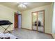 Bedroom with organ and sliding mirrored doors at 3801 W Barnes Ln, Phoenix, AZ 85051