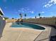 Relaxing kidney shaped pool in sunny backyard at 3801 W Barnes Ln, Phoenix, AZ 85051