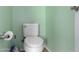 Simple bathroom with toilet and light green walls at 41405 W Cielo Ln, Maricopa, AZ 85138