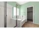 Bathroom boasts a shower, tub, and updated vanity at 41405 W Cielo Ln, Maricopa, AZ 85138