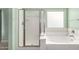 Bathroom with shower, tub, and updated vanity at 41405 W Cielo Ln, Maricopa, AZ 85138