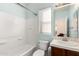 Clean bathroom with tiled shower/tub and vanity at 41405 W Cielo Ln, Maricopa, AZ 85138