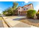 Two-story house with a front yard and a sidewalk at 41405 W Cielo Ln, Maricopa, AZ 85138