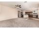Open concept kitchen with island and stainless steel appliances at 41405 W Cielo Ln, Maricopa, AZ 85138