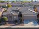 Single-story home with a two-car garage and desert landscaping at 42413 W Abbey Rd, Maricopa, AZ 85138