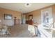Bright bedroom with patio access and built-in dresser at 42413 W Abbey Rd, Maricopa, AZ 85138