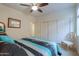 Spacious bedroom with ample closet space at 42413 W Abbey Rd, Maricopa, AZ 85138