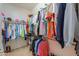 Large walk-in closet with plenty of storage at 42413 W Abbey Rd, Maricopa, AZ 85138