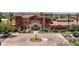 Community clubhouse with fountain and landscaping at 42413 W Abbey Rd, Maricopa, AZ 85138