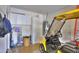 Garage with storage and golf cart at 42413 W Abbey Rd, Maricopa, AZ 85138
