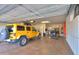 Garage with golf cart, Jeep, and ample storage at 42413 W Abbey Rd, Maricopa, AZ 85138