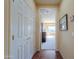 Hallway leading to Primary bedroom at 42413 W Abbey Rd, Maricopa, AZ 85138