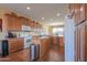 Kitchen with ample counter space and wood cabinets at 42413 W Abbey Rd, Maricopa, AZ 85138