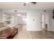 Open living area with a view into the dining area and kitchen at 4705 W Northern Ave, Glendale, AZ 85301