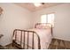 Bedroom with antique brass bed frame at 4872 E Sandwick Dr, San Tan Valley, AZ 85140