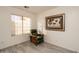 Bedroom with wood-look floors and a green recliner chair at 4872 E Sandwick Dr, San Tan Valley, AZ 85140