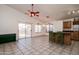 Dining area with sliding door to backyard and kitchen at 4872 E Sandwick Dr, San Tan Valley, AZ 85140