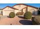 One-story house with a two-car garage and well-maintained landscaping at 4872 E Sandwick Dr, San Tan Valley, AZ 85140
