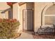 Beige front door with a decorative metal screen and sidelights at 4872 E Sandwick Dr, San Tan Valley, AZ 85140