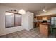 Bright kitchen features an island, stainless steel appliances, and wood cabinets at 4872 E Sandwick Dr, San Tan Valley, AZ 85140