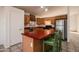 Kitchen with island, stainless steel appliances, and wood cabinets at 4872 E Sandwick Dr, San Tan Valley, AZ 85140