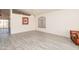 Bright living room with wood-look floors and a chandelier at 4872 E Sandwick Dr, San Tan Valley, AZ 85140