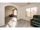 Bright living room with hardwood floors and comfy chairs at 4872 E Sandwick Dr, San Tan Valley, AZ 85140