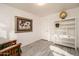 Spacious office with hardwood floors, built-in shelving and large art at 4872 E Sandwick Dr, San Tan Valley, AZ 85140