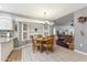 Charming breakfast nook with built-in shelving and a round table at 500 E Encinas Ave, Gilbert, AZ 85234