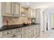 Elegant butler's pantry with granite countertops and custom cabinetry at 500 E Encinas Ave, Gilbert, AZ 85234