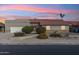 Single-story home with a terracotta tile roof and landscaped front yard at 500 E Encinas Ave, Gilbert, AZ 85234