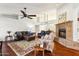 Spacious living room features a brick fireplace and hardwood floors at 500 E Encinas Ave, Gilbert, AZ 85234