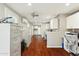 Home office with wood floors and built-in cabinetry at 500 E Encinas Ave, Gilbert, AZ 85234