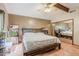 Spacious bedroom with wood flooring and large closet at 5301 E Mitchell Dr, Phoenix, AZ 85018